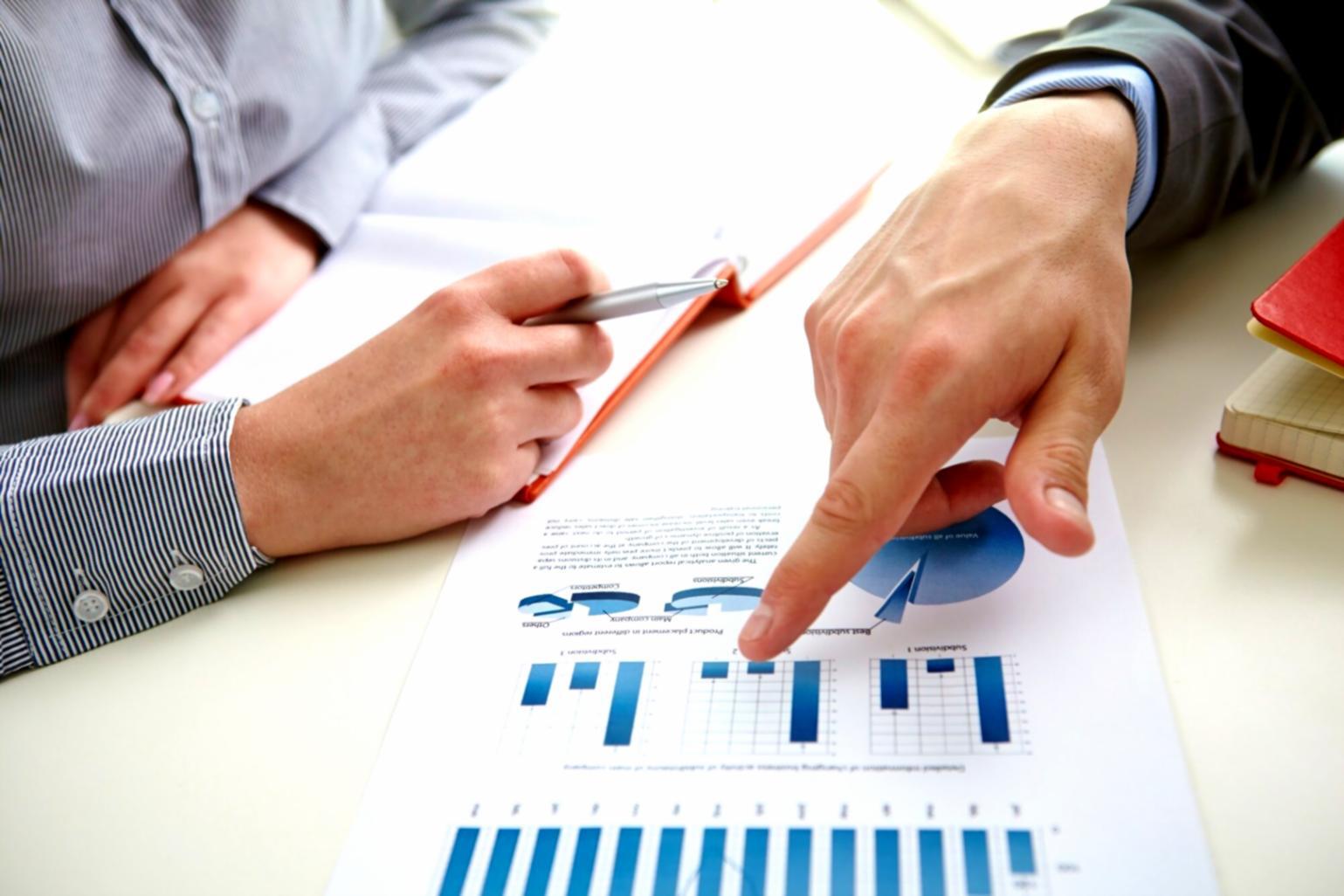 Creative professionals collaborating on financial planning strategies